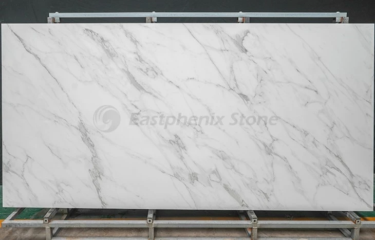 White sintered stone island with sink
